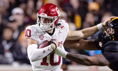 Oklahoma Sooners quarterback John Mateer scrambling during game against the Tennessee Volunteers